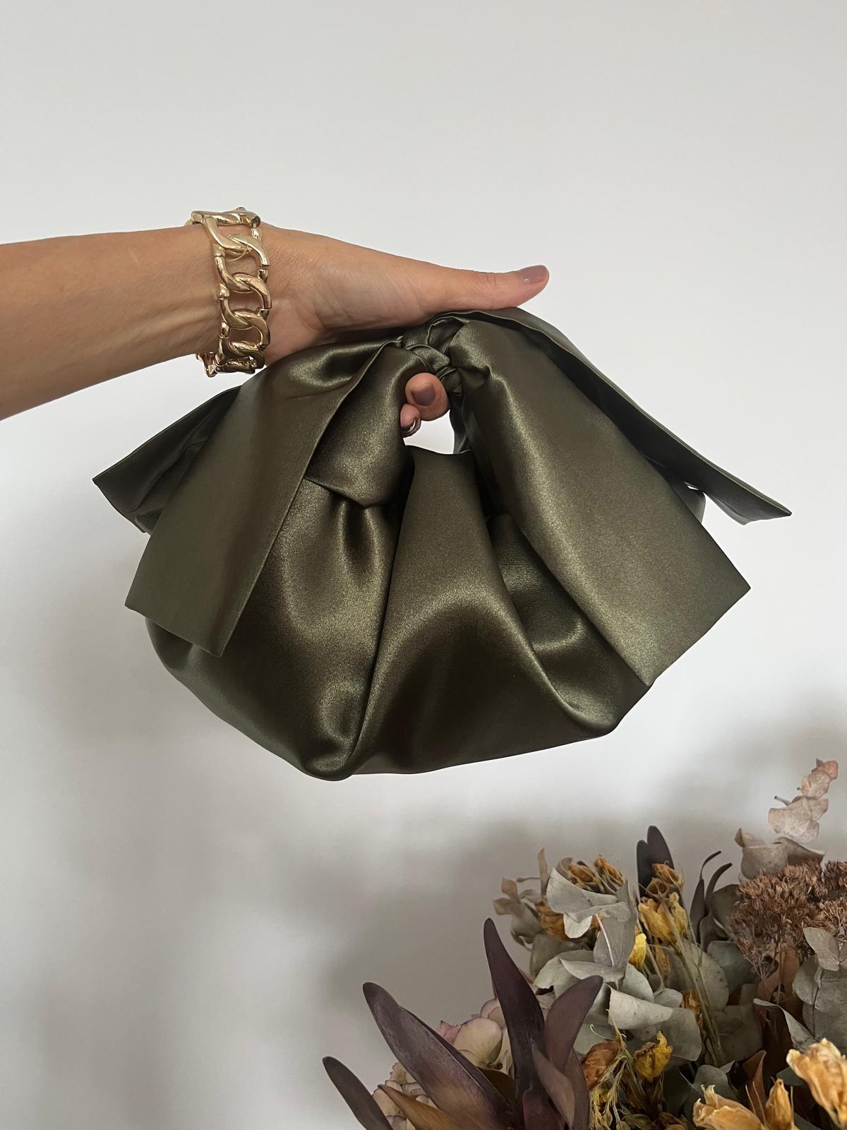 The Knot — Caqui